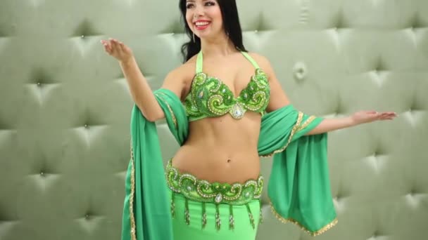 Female model in oriental style costume poses — Stock Video