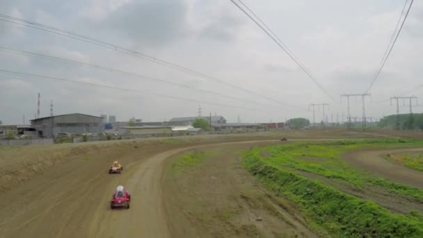 Racing cars riding by ground track — Stock Video