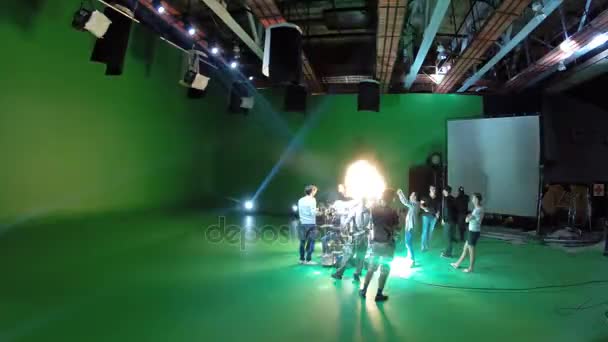 Shooting of clip go in the green studio with smoke — Stock Video