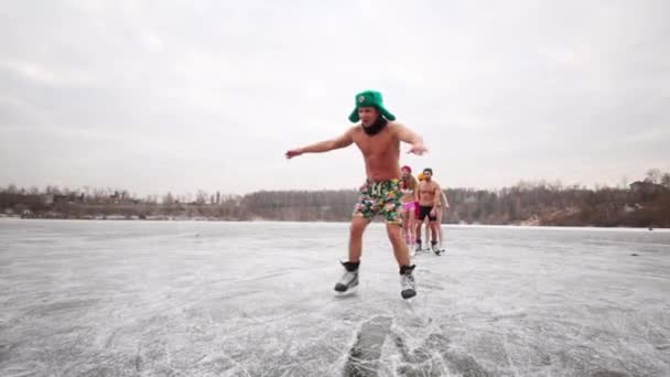 Boys and girls in swimsuits on ice rink — Stock Video