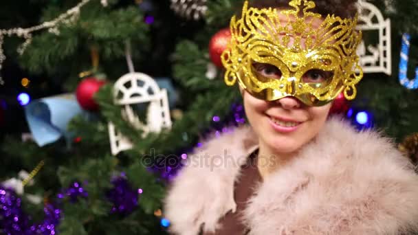 Young Woman Fur Mantle Golden Carnival Mask Holiday Fir Tree — Stock Video