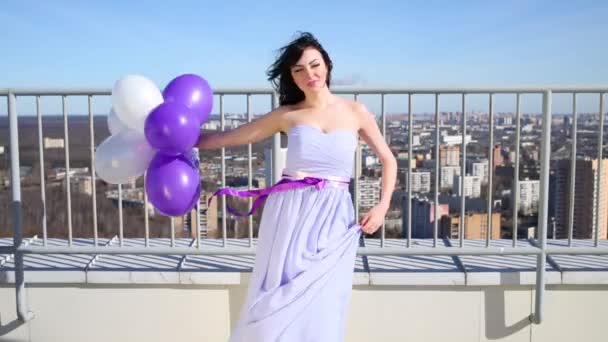 Girl Brunette Blue Dress Posing White Purple Air Balloons Roof — Stock Video