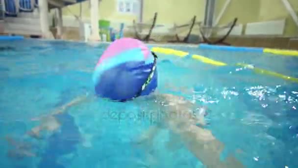 Little Boy Goggles Dives Touches Bottom Pool — Stock Video