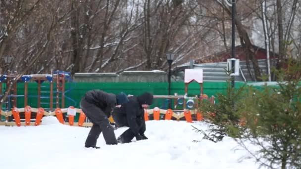 Man Boy Teenager Play Snowball Fight Playground Snowfall — Stock Video