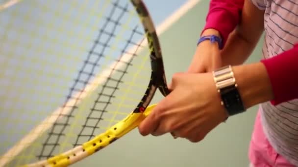 Teacher Helps Girl Hold Racket Close View — Stock Video