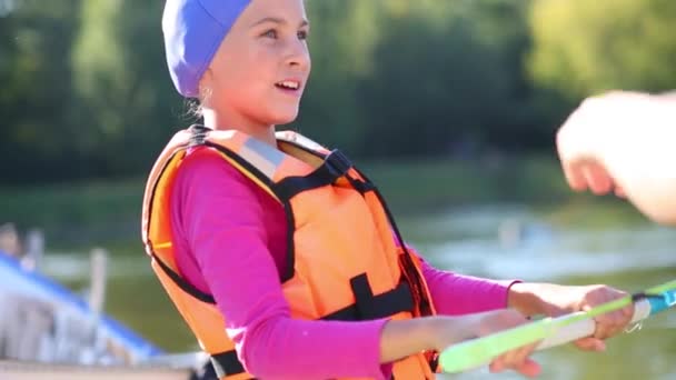 Girl Life Jacket Hat Holding Bar Next Instructor — Stock Video