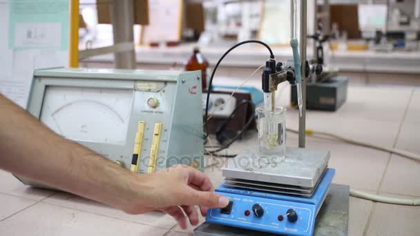 Male Hand Turns Configures Magnetic Stirrer Heating Millivoltmeter Chemical Laboratory — Stock Video