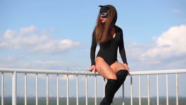 Woman Cat Black Costume Sits Railing Roof — Stock Video