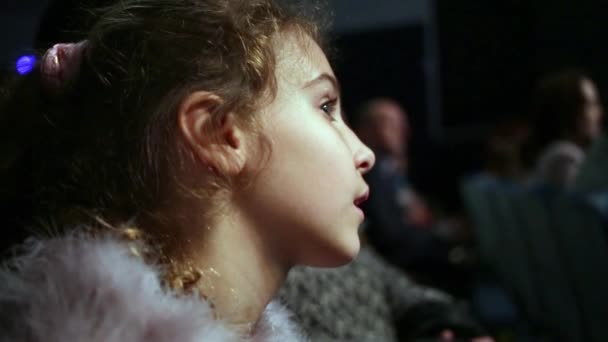 Closeup Profile Face Little Girl Dressed Fur Mantle Watching Performance — Stock Video