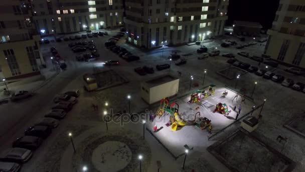 People Get Fun Playground Residential Complex Elk Island Winter Evening — Stock Video