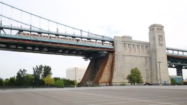 Train Moves Benjamin Franklin Bridge — Stock Video