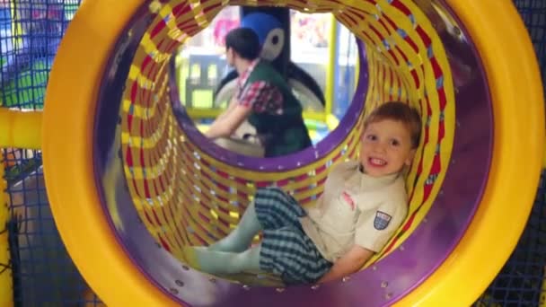 Happy Little Cute Boy Playing Pipe Playing Zone — Stock Video