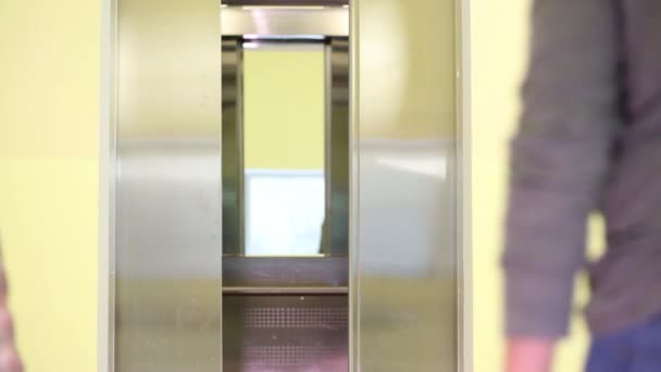 Parents Daughter Enter Elevator Residential Building — Stock Video