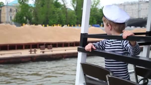 Boy Cap Vest Boat Looks Barge Sand Floats — Stock Video