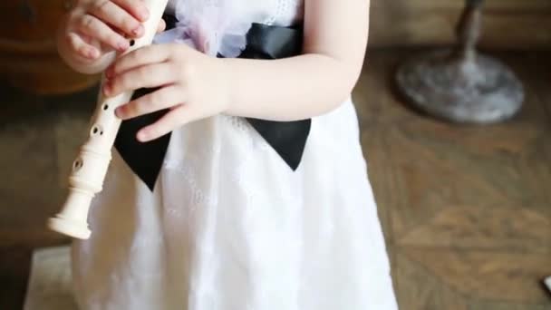 Hands Little Girl Dress Playing Flute Retro Room — Stock Video