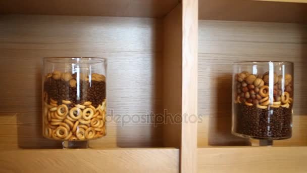 Driers Nuts Coffee Beans Three Glass Jars Shelf — Stock Video