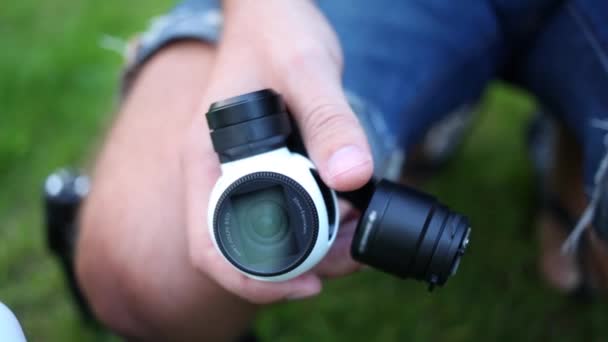 Portable Video Camera Lens Bracing Human Hands Close — Stock Video