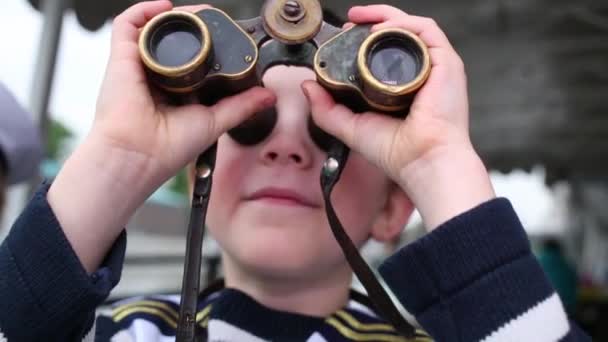 Little Boy Striped Vest Looks Binoculars Deck — Stock Video