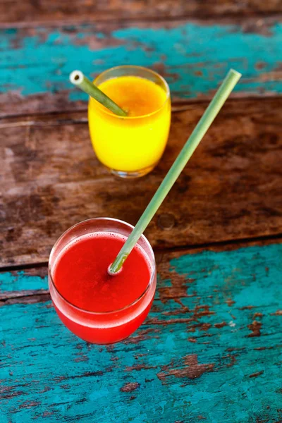 Tropical juices on a table — Stock Photo, Image