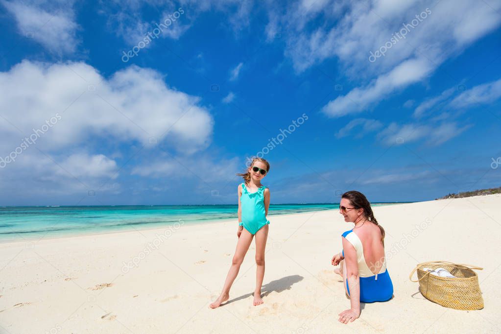 Mother and daughter at beach