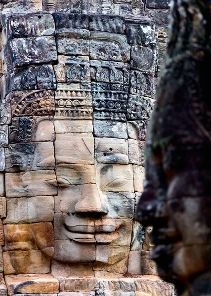 Ansikten av antika Bayon templet — Stockfoto