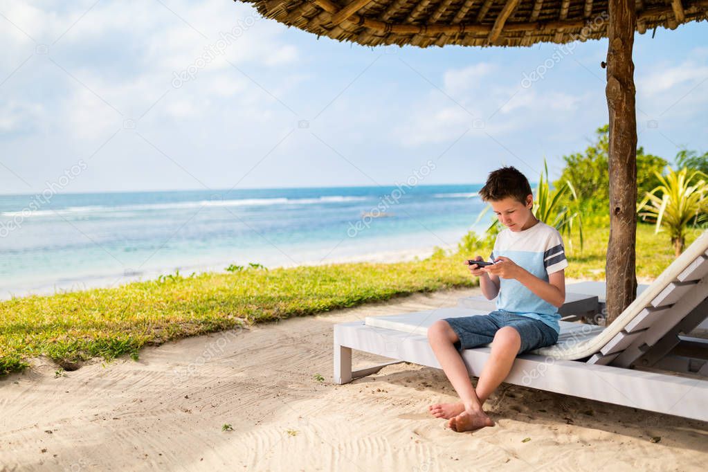 Teenage boy at beach