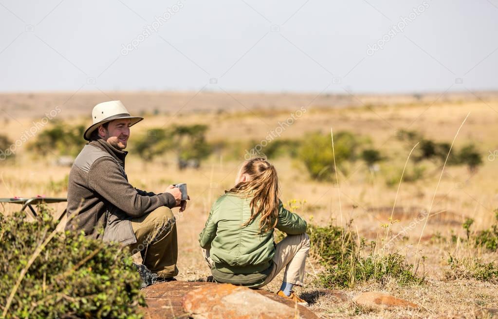 father and child on African safari