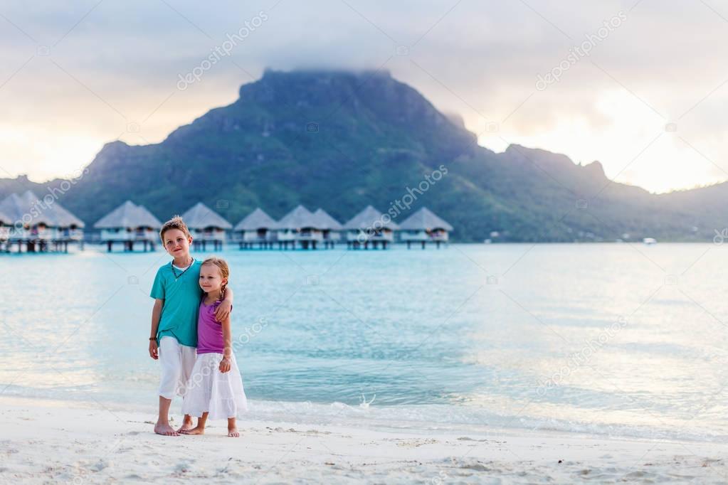 Two kids at tropical beach