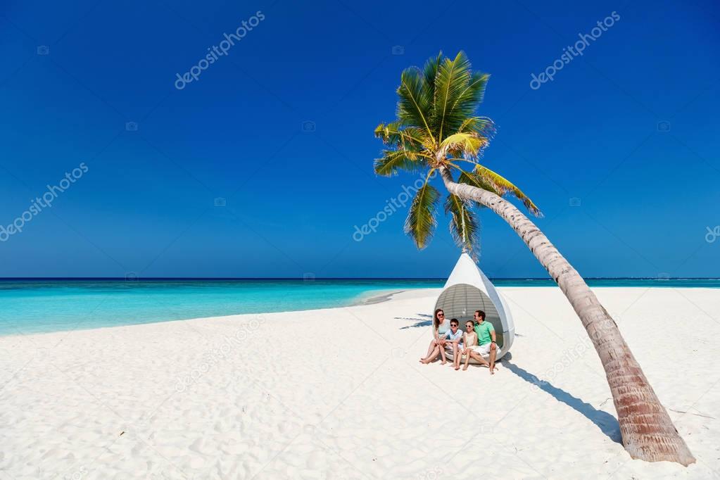 Family on a tropical beach vacation