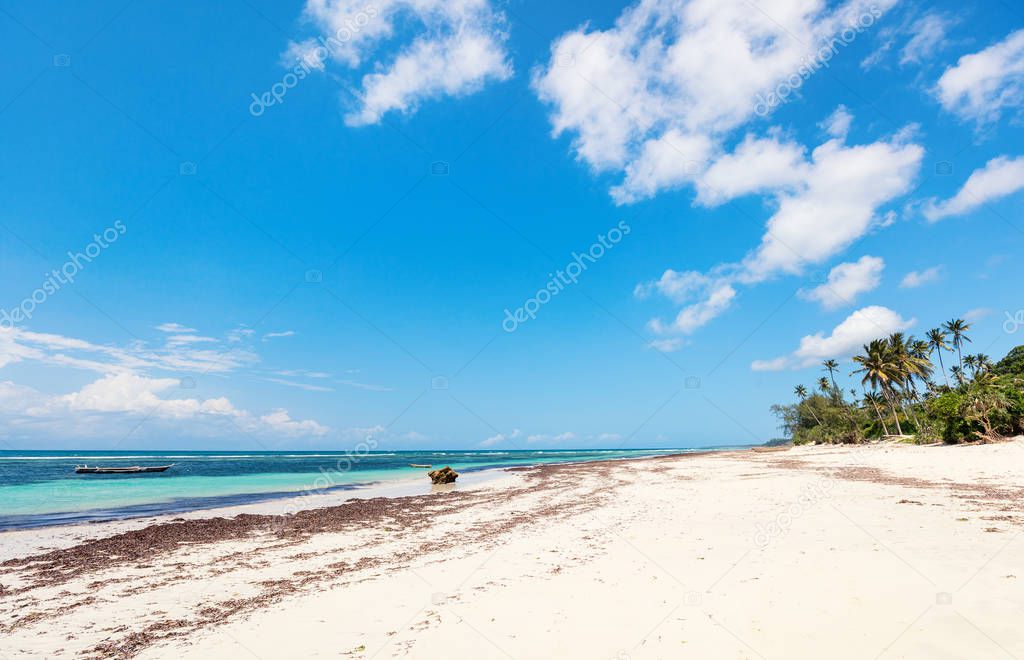 Landscape photo of beautiful white sand exotic beach in Kenya Africa