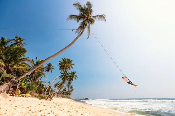 Young Man Having Fun Swinging Rope Tropical Island Beach Sri — Stock Photo, Image