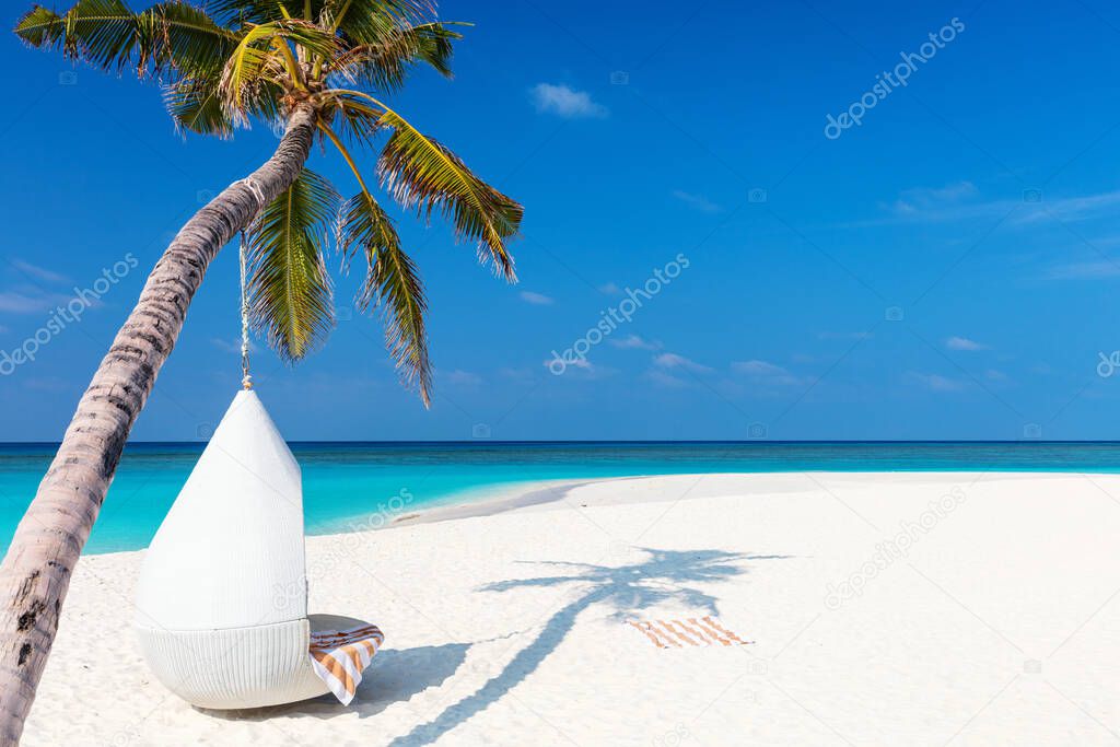 Perfect tropical white sand beach with coconut palms
