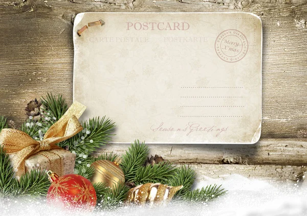 Christmas postcard template with branches and decorations — Stock Photo, Image