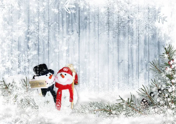 Weihnachtsstillleben mit Schneemann und Tanne auf einem hölzernen Rücken lizenzfreie Stockfotos