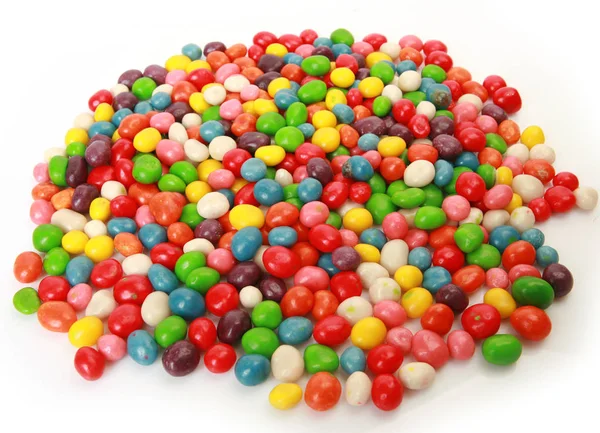 Beyaz Üzerine Yuvarlak Renkli Şeker — Stok fotoğraf