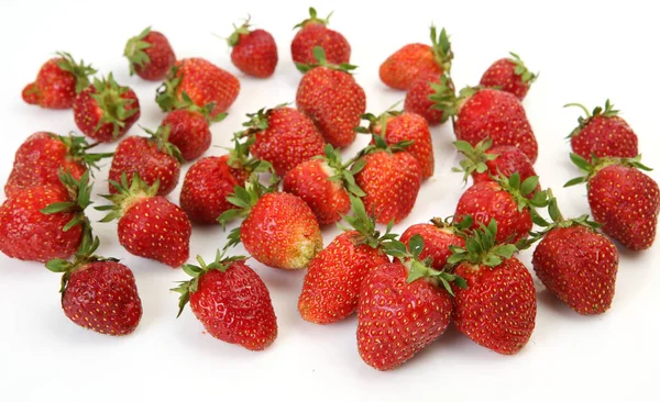 Ripe strawberry on a white background — Stock Photo, Image