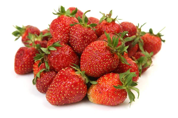 Ripe strawberry on a white background — Stock Photo, Image