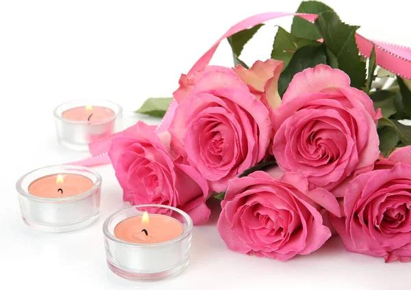 Pink roses and candles — Stock Photo, Image