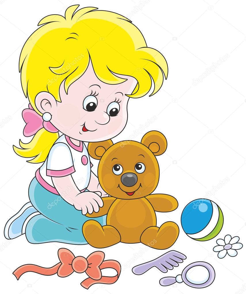 Little girl and Teddy bear