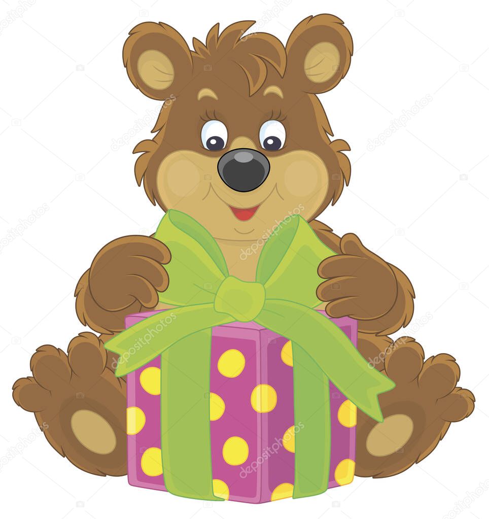 Joyful and friendly smiling little brown bear and a beautiful box with a holiday gift, vector cartoon illustration