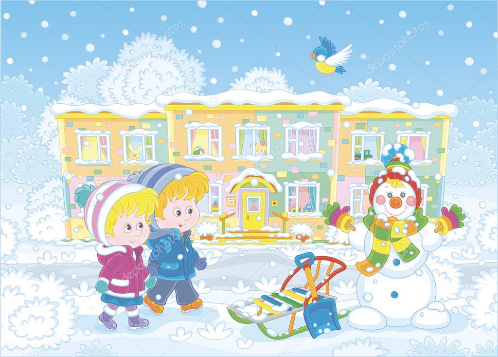 Smiling little kids going to their nursery school and looking at a funny snowman on a snow-covered playground of a winter park on a beautiful snowy day, vector illustration in a cartoon style