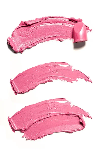 Pintura de esfregaço rosa de produtos cosméticos — Fotografia de Stock