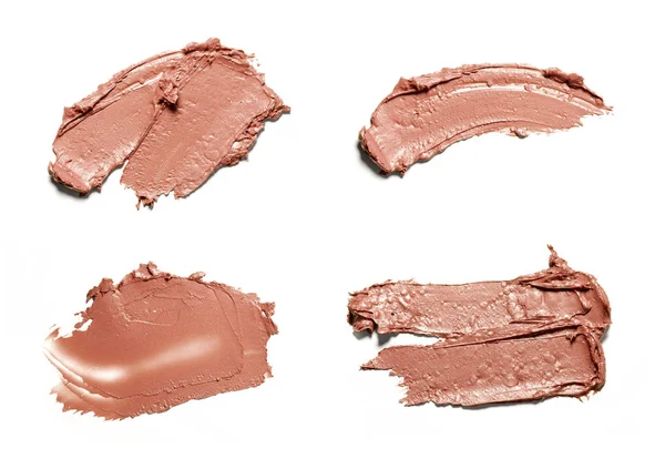 Beige smeta paint av kosmetiska produkter — Stockfoto