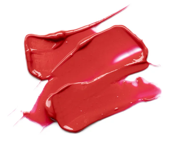 Pintura de esfregaço vermelho de produtos cosméticos — Fotografia de Stock