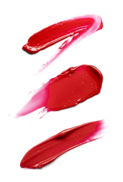 Rode uitstrijkje verf van cosmetische producten — Stockfoto