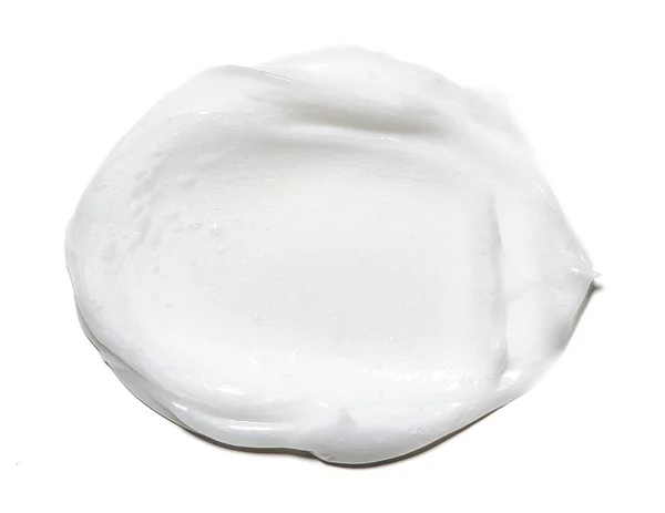 Smear paint of white cosmetic products — Stock Photo, Image