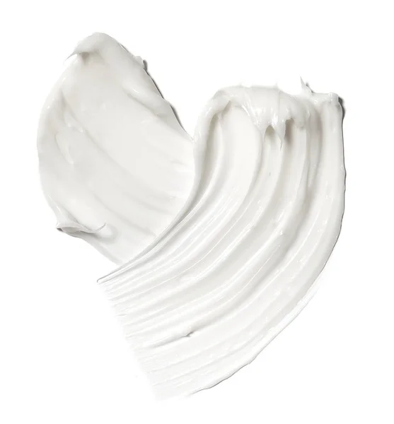 Smear paint of white cosmetic products — Stock Photo, Image
