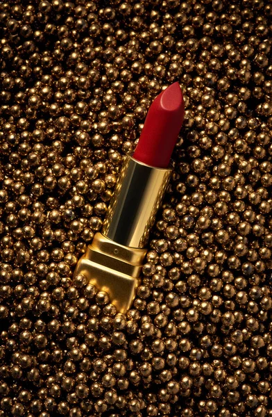 classic red lipstick in a gold case