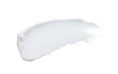 Beyaz desen ve yüz kremi lekesi veya beyaz arkaplanda izole edilmiş beyaz akrilik boya