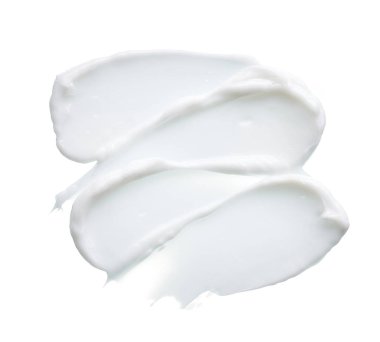 Beyaz desen ve yüz kremi lekesi veya beyaz arkaplanda izole edilmiş beyaz akrilik boya